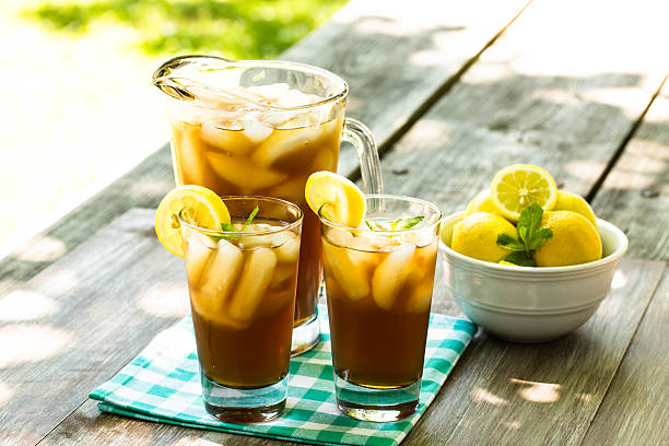 Two Glasses of Iced Tea With Lemons stock photo
