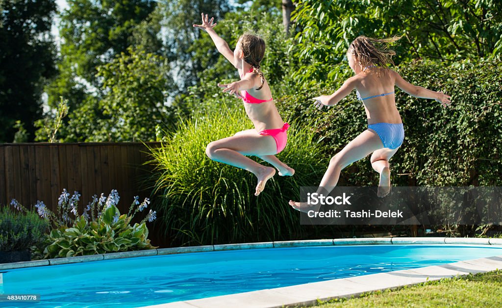 Jump In Water Jump In Water. Taking the Plunge Stock Photo