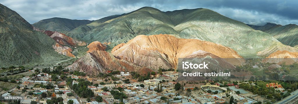 Multicolored mountains known as Cerro de los 7 colores Multicolored mountains known as Cerro de los 7 colores (hill of seven colors) in Purmamarca at sunrise, Jujuy province, Argentina 2015 Stock Photo