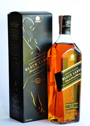 Darlington, England - August 4, 2015:  Johnnie Walker Black Label bottle and box. The Black Label is a 12 year aged scotch whisky, from the Ayrshire region of Scotland.
