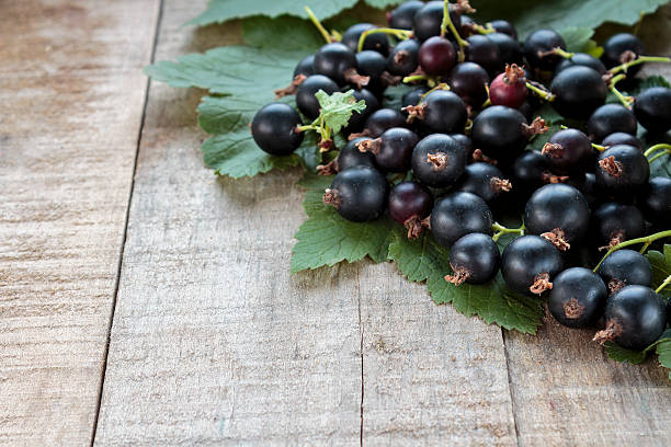 istock Gooseberries Hybrid on rustic wooden table 483412026