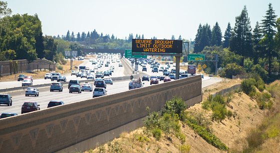 Sacramento, USA - August 5, 2015:  Motorists are being warned of severe drought conditions with road signs along U.S. Highway 50 in Northern California. 
