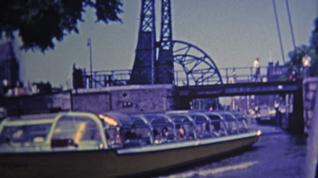 1969: Ride on boating canals and past classic bridges.