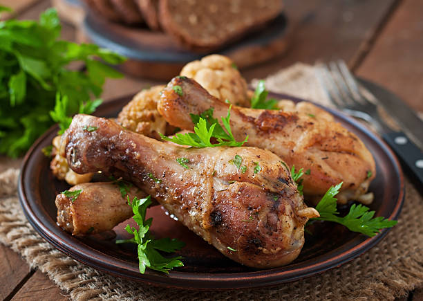 istock Chicken leg with baked cauliflower and parsley 483413390