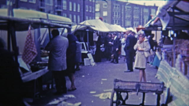 1969: Outdoor market selling dried fish and other foods and goods.