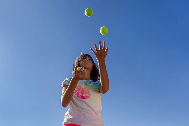 istock Juggling tennis balls. 483413788
