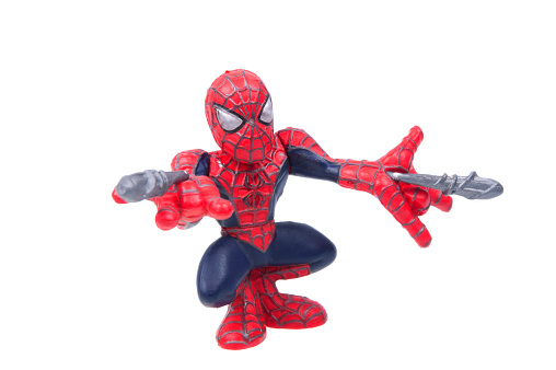 Adelaide, Australia - August 14, 2015: A Studio shot of a Spiderman Action Figure isolated on a white background. Merchandise from Marvel comics and movies are highly sought after collectables.