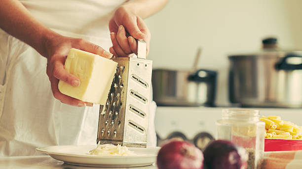 ralagem queijo - recipe ingredient grater cheese grater imagens e fotografias de stock