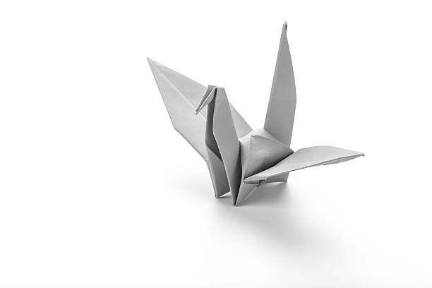 istock white bird origami on white background. 483431066