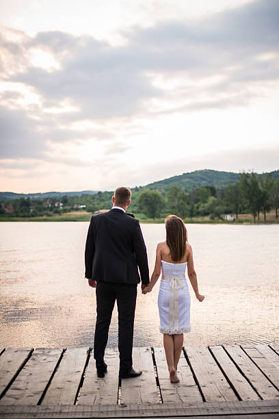 istock Young couple hiking on the dock 483431538