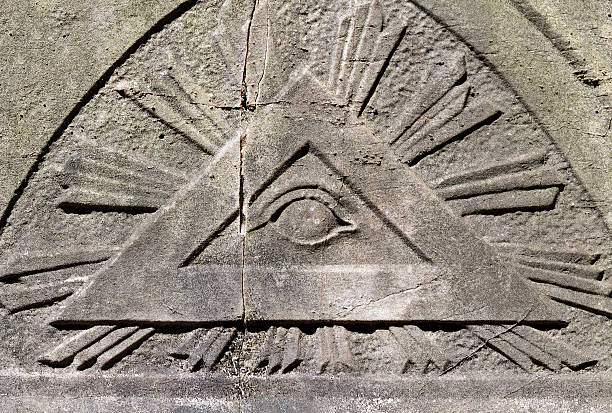 The All Seeing Eye The All Seeing Eye. Masonic representation of Osiris. Many will note the triangle and the eye which is associated with the Illuminati. masonic symbol stock pictures, royalty-free photos & images