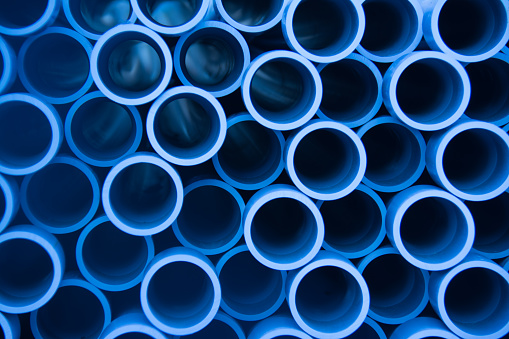Stack of pipes waiting on a construction site