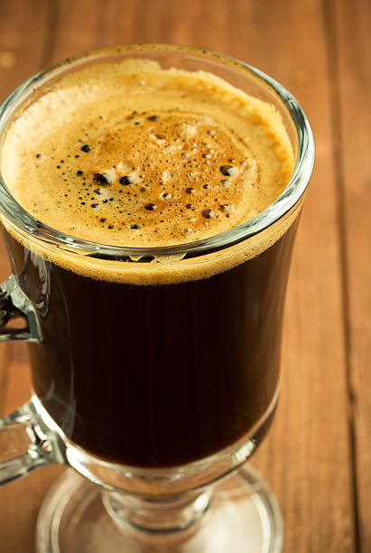 istock cup of coffee on wood 483436852