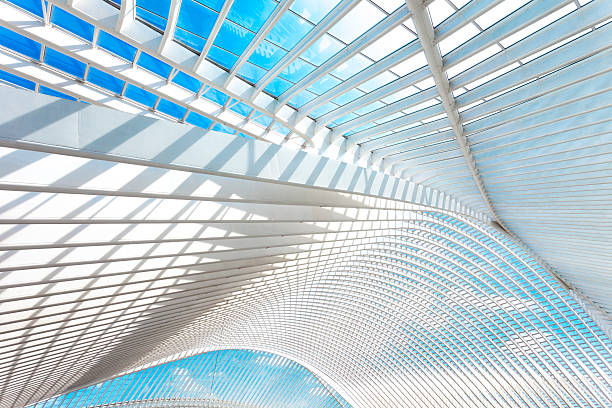 Futuristic Architecture futuristic roof of a modern transportation building, Liege Guillemins railroad station, Belgium liege belgium stock pictures, royalty-free photos & images