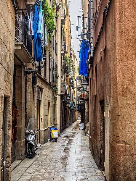 istock Small street in Barcelona Gothic quarter 483440546