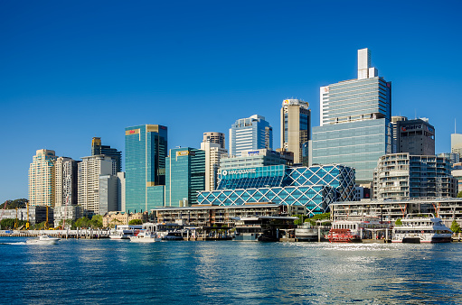 Sydney, Australia - September 14, 2012: Modern skyscrapers in the Sydney Business District, view from the Darling Harbor. Sydney is the state capital of New South Wales.