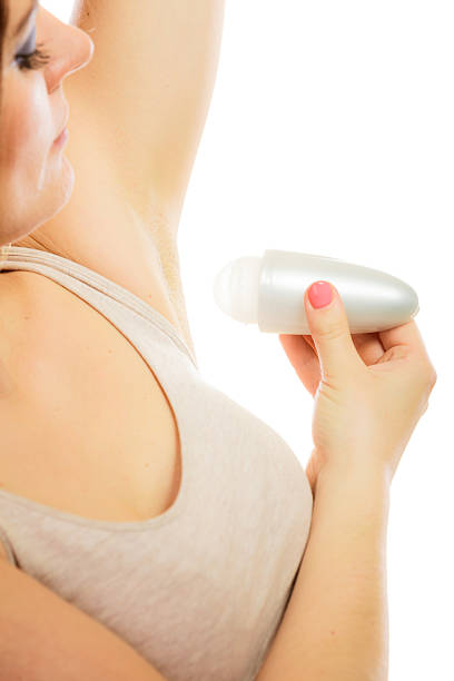 istock Girl applying stick deodorant in armpit. 483446308