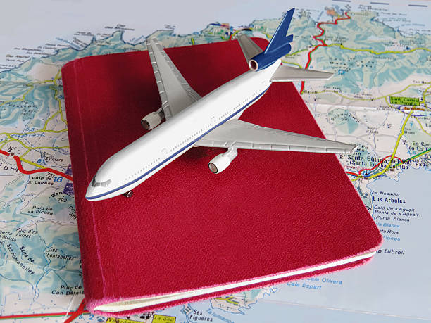 istock model aircraft with neutral passport and map background 483446594