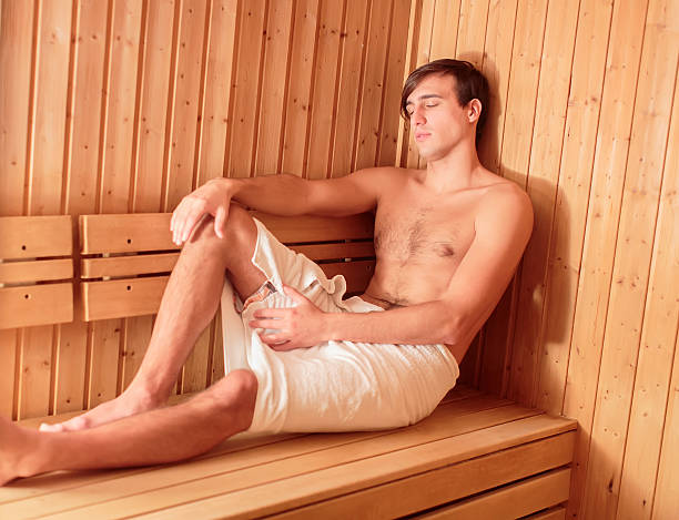 istock Young man relaxing in the sauna 483447433
