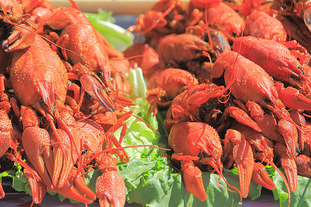 istock Red cooked crayfish on a city street 483448868
