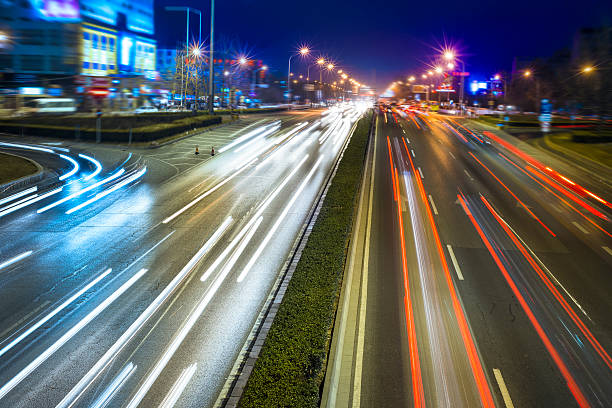 istock Rush hour traffic at night on multiple lane highway 483449449