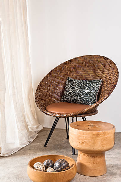 istock Brown rattan Chair in interior setting 483451425