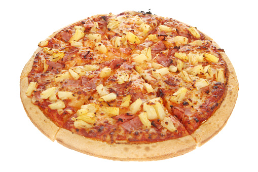 Hawaiian pizza with pineapple on white