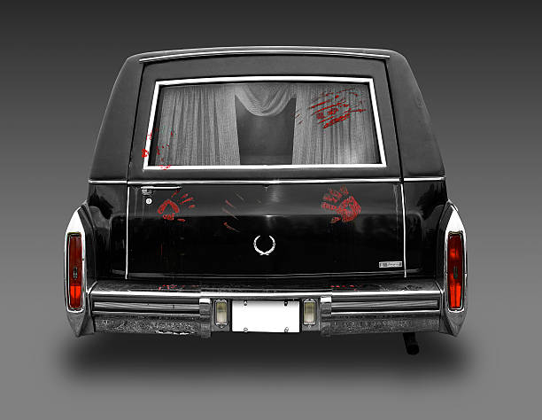 Cadillac hearse with bloody prints and clipping path A classic Cadillac hearse complete with bloody fingerprints, an open copy space on the license plate and a clipping path hearse photos stock pictures, royalty-free photos & images