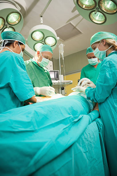 istock Medical team operating a patient 483454165