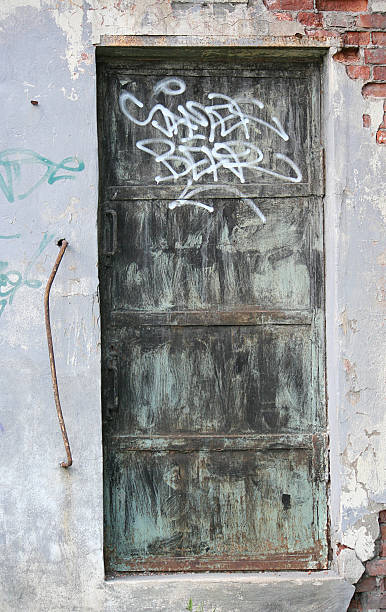 istock Old weathered door, grunge background 483455920