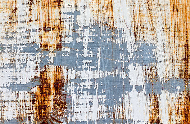 istock background of peeling paint and rusty old metal 483458150