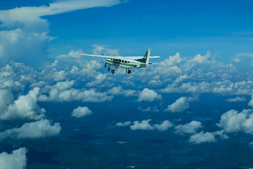 Chonburi, Thailand - May 16, 2015: Cessna 208 Caravan of KASET, Bureau of Royal Rainmaking and Agricultural Aviation. Landing to Chonburi, U-TAPAO  Airport.