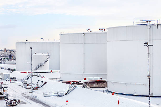 istock white tanks in tank farm with snow in winter 483459328