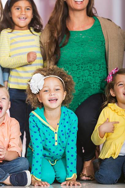 istock Little girl with her preschool class 483465450