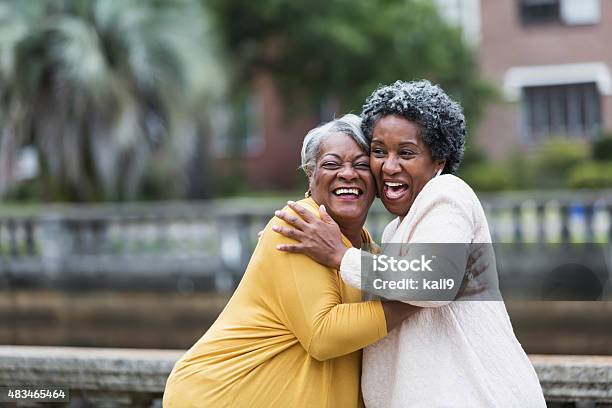 Senior Black Women Embracing Stock Photo - Download Image Now - Senior Adult, Friendship, Women