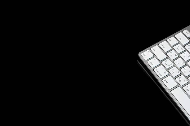 istock Close-up Of Multilingual  Wireless Keyboard Isolated On Black Ba 483466356
