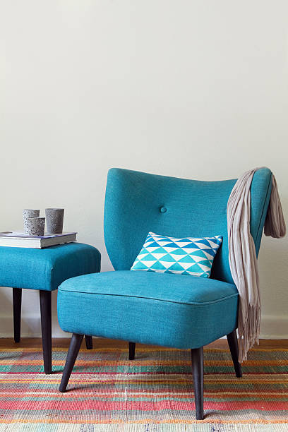 istock Retro teal armchair and ottoman decor items home interior 483468754