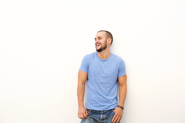 Young man with blue shirt laughing