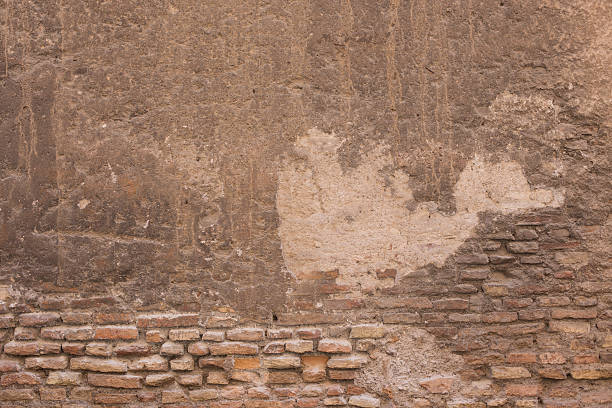 istock Antique textured wall from stone in Rome 483476770