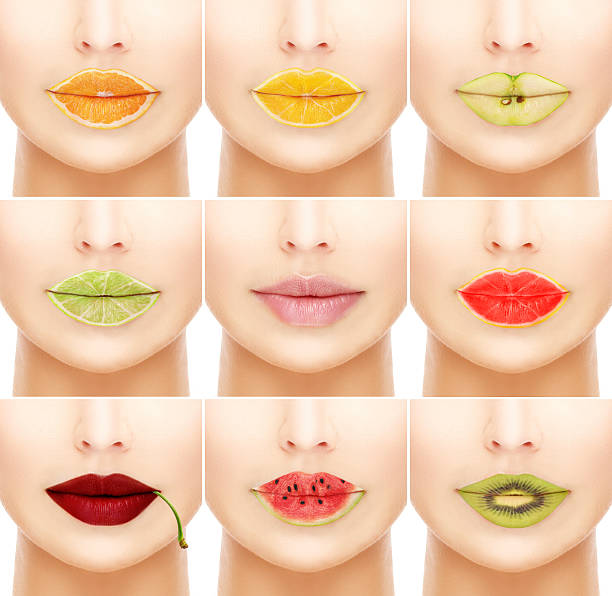 istock Woman's mouths with fruity lip gloss. 483480295