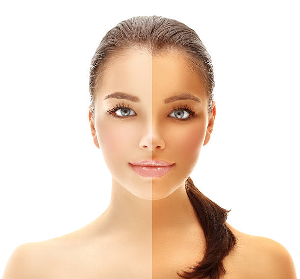 istock Model's face divided in two parts - tanned and natural. 483480847