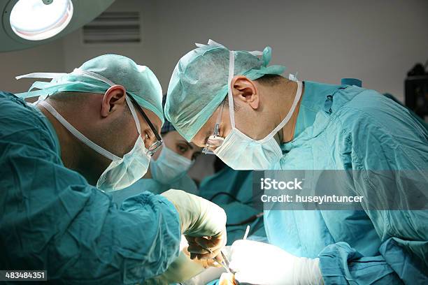 Doctors On The Operations Stock Photo - Download Image Now - Adult, Cutting, Doctor