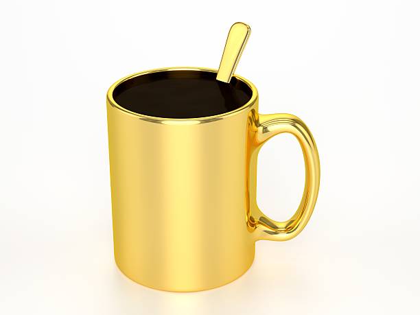 Golden Mug With Black Coffee stock photo