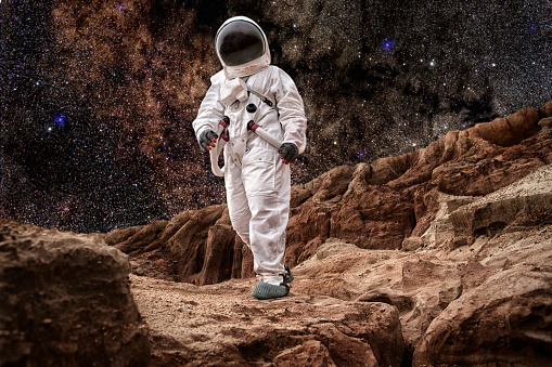 Astronaut Walking On Mars or the Moon.