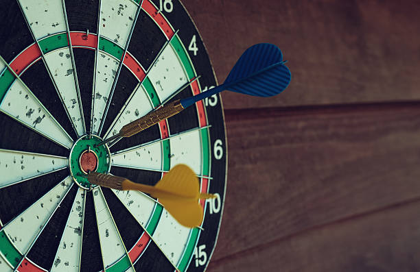 istock Darts arrows in the target center. 483485704