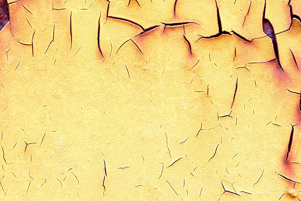 A background of peeling paint and rusty old metal