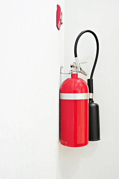 istock install a fire extinguisher  longtime on the wall in buiding 483486138