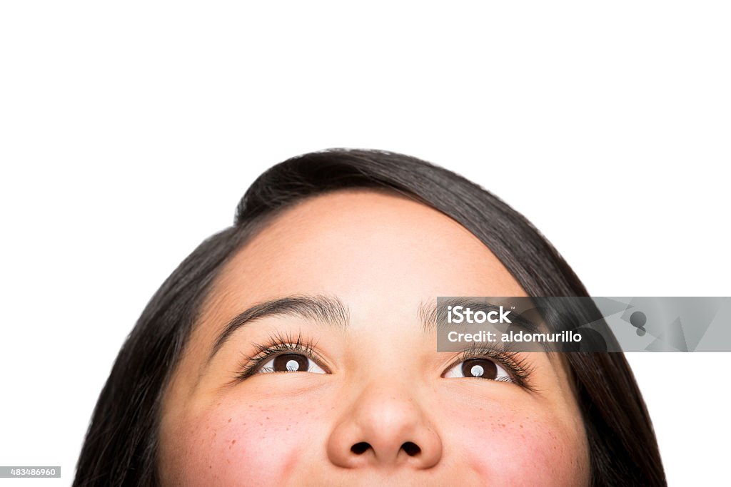 Mexican girl looking up Mexican girl looking up isolated over white background Looking Up Stock Photo