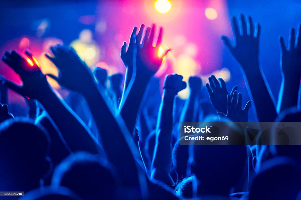 Concert Crowd Cheering crowd at concert  Crowd of People Stock Photo