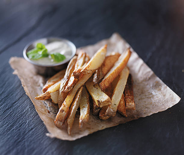 istock potato fries with mint dip on the side 483497026